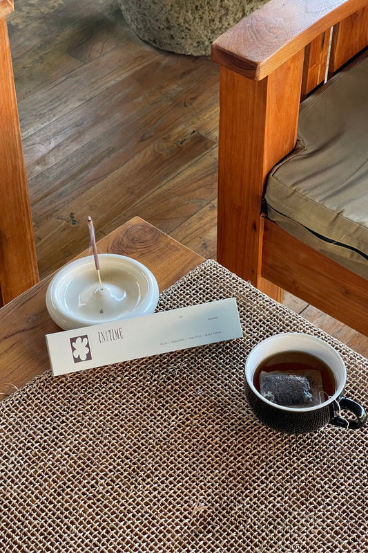 2PM Recharge Incense burning in a styled setting