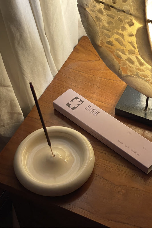 10PM Rest Incense burning in a styled setting