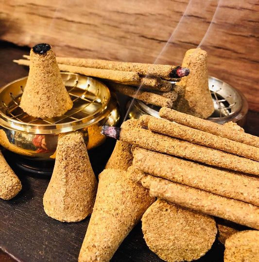 Palo Santo incense styled with a brass burner